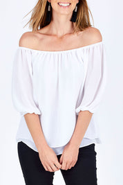 Model Riina wearing size 10 of The Double Layer Top in colour White (White), from the front, cropped image