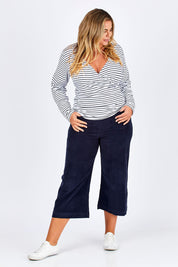 Model Fiona wearing size 16 of The Wrap Jersey Top in colour NavyStripe (Blue), from the front, showing the whole outfit
