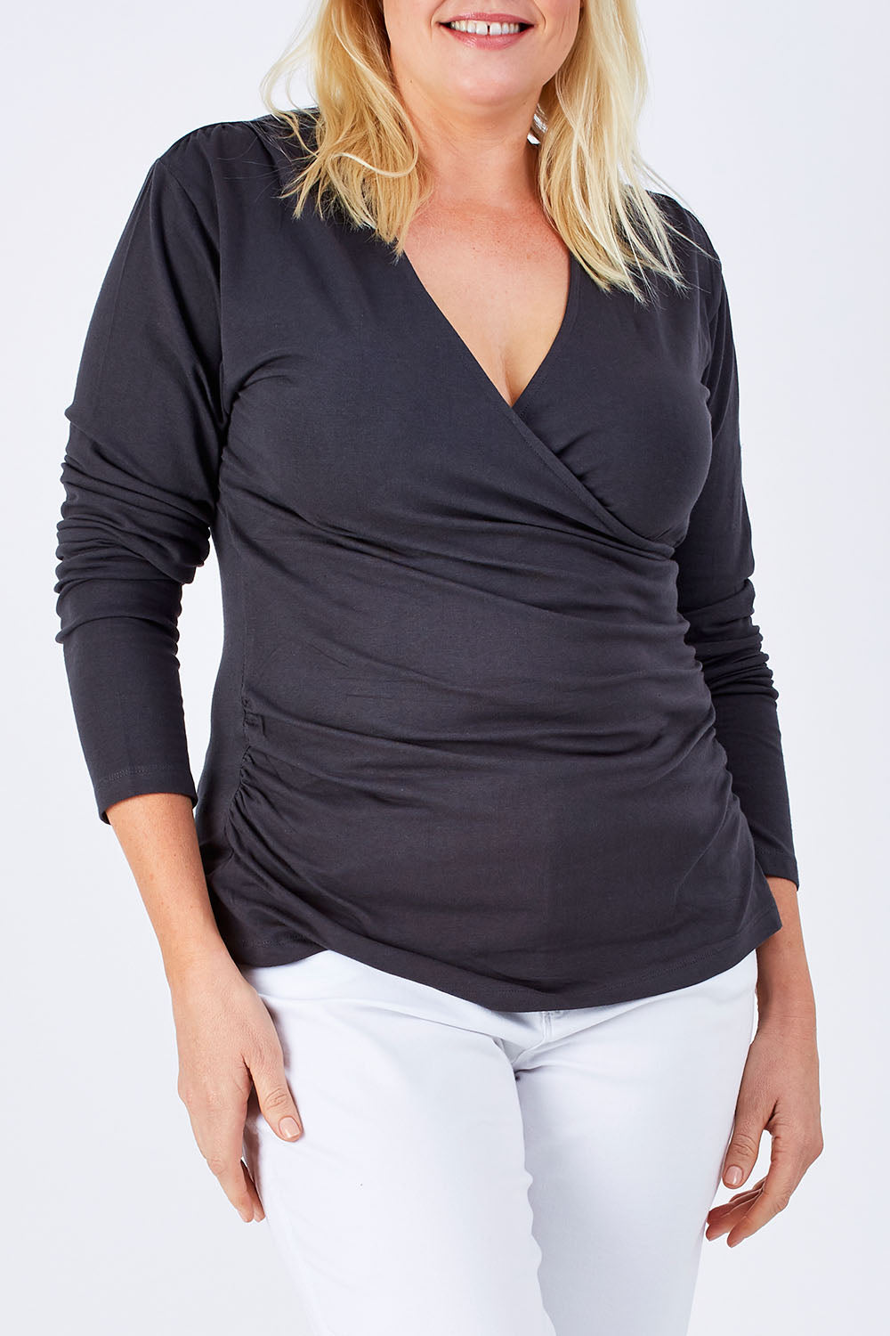 Model Natalie wearing size 16 of The Wrap Jersey Top in colour Charcoal (Grey), from the front, cropped image