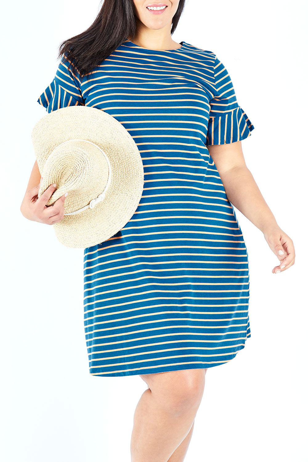 Model Lauren wearing size 18 of The Cotton Bamboo Frill Dress in colour Bluegold (Blue), from the front, cropped image