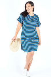 Model Lauren wearing size 18 of The Cotton Bamboo Frill Dress in colour Bluegold (Blue), from the front, showing the whole outfit