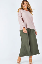 Model Fiona wearing size 16 of The Wide Leg Relaxed Pant in colour Khaki (Green), from the front, showing the whole outfit