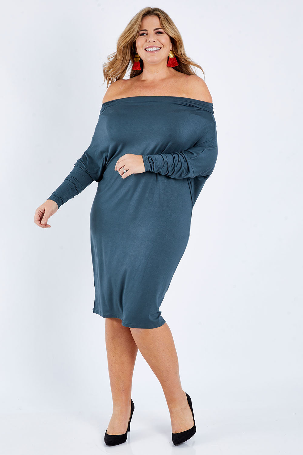 Model Fiona wearing size 16 of The Multiin colourWay Dress - Forest (Green), from the front, showing the whole outfit