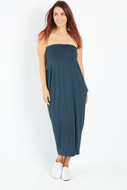 Model Laura wearing size 14 of The Multiin colourWay Dress - Forest (Green), from the front, showing the whole outfit