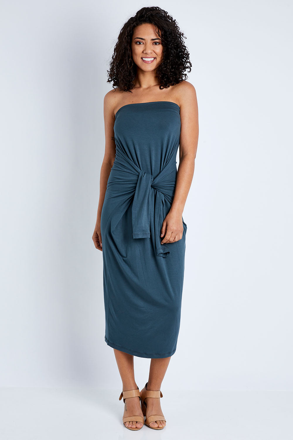 Model Pamela wearing size 10 of The Multiin colourWay Dress - Forest (Green), from the front, showing the whole outfit