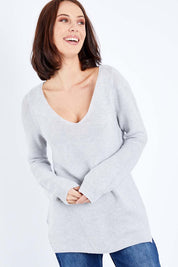 Model Andrea wearing size S of The Relaxed V Neck Pullover in colour Silver (Grey), from the front, cropped image