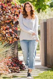 Model Laura wearing size L of The Relaxed V Neck Pullover in colour Silver (Grey), from the front, showing the whole outfit