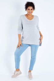 Model Sasha-Lee wearing size XL of The Relaxed V Neck Pullover in colour Silver (Grey), from the front, showing the whole outfit