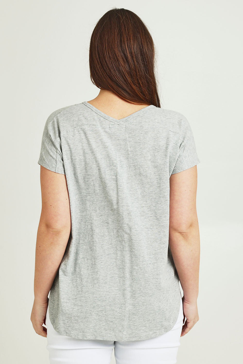 Model Jane wearing size 14 of The Basic Cotton Blend Tee in colour Greymarle (Grey), from the back