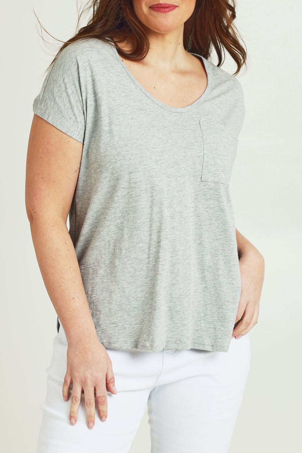 Model Jane wearing size 14 of The Basic Cotton Blend Tee in colour Greymarle (Grey), from the front, cropped image