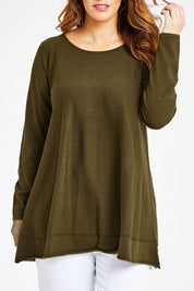 Model Laura wearing size L of The Swing Knit in colour Khaki (Green), from the front, cropped image