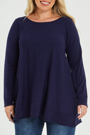 Model Katie wearing size XL of The Swing Knit in colour Navy (Blue), from the front, cropped image