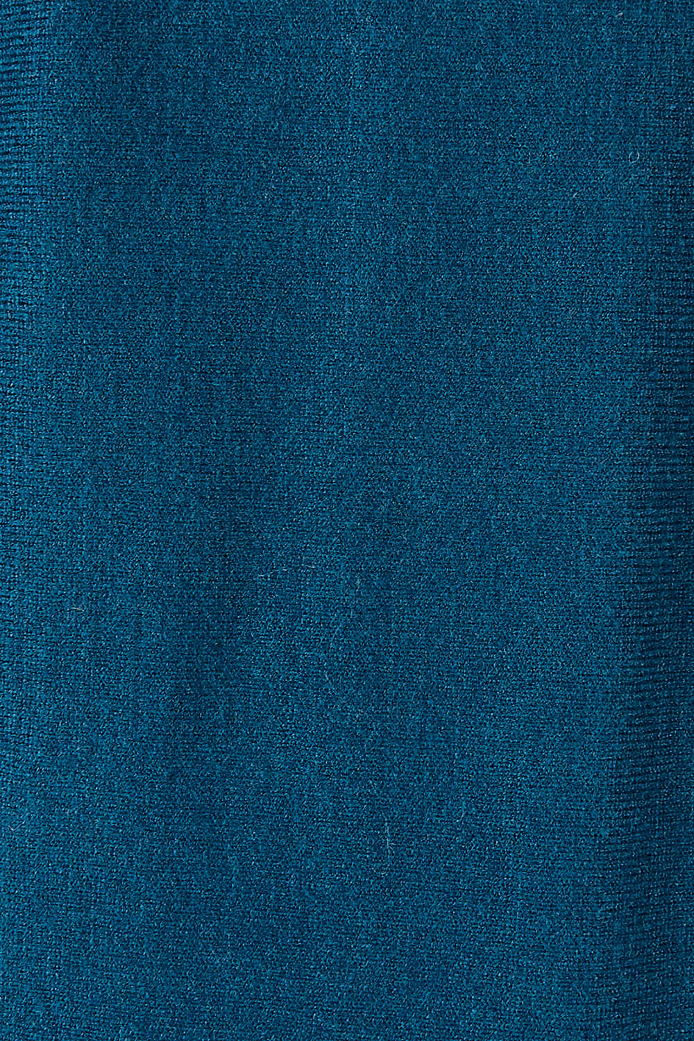 Product shot of The Swing Knit in colour Petrol (Blue), detail