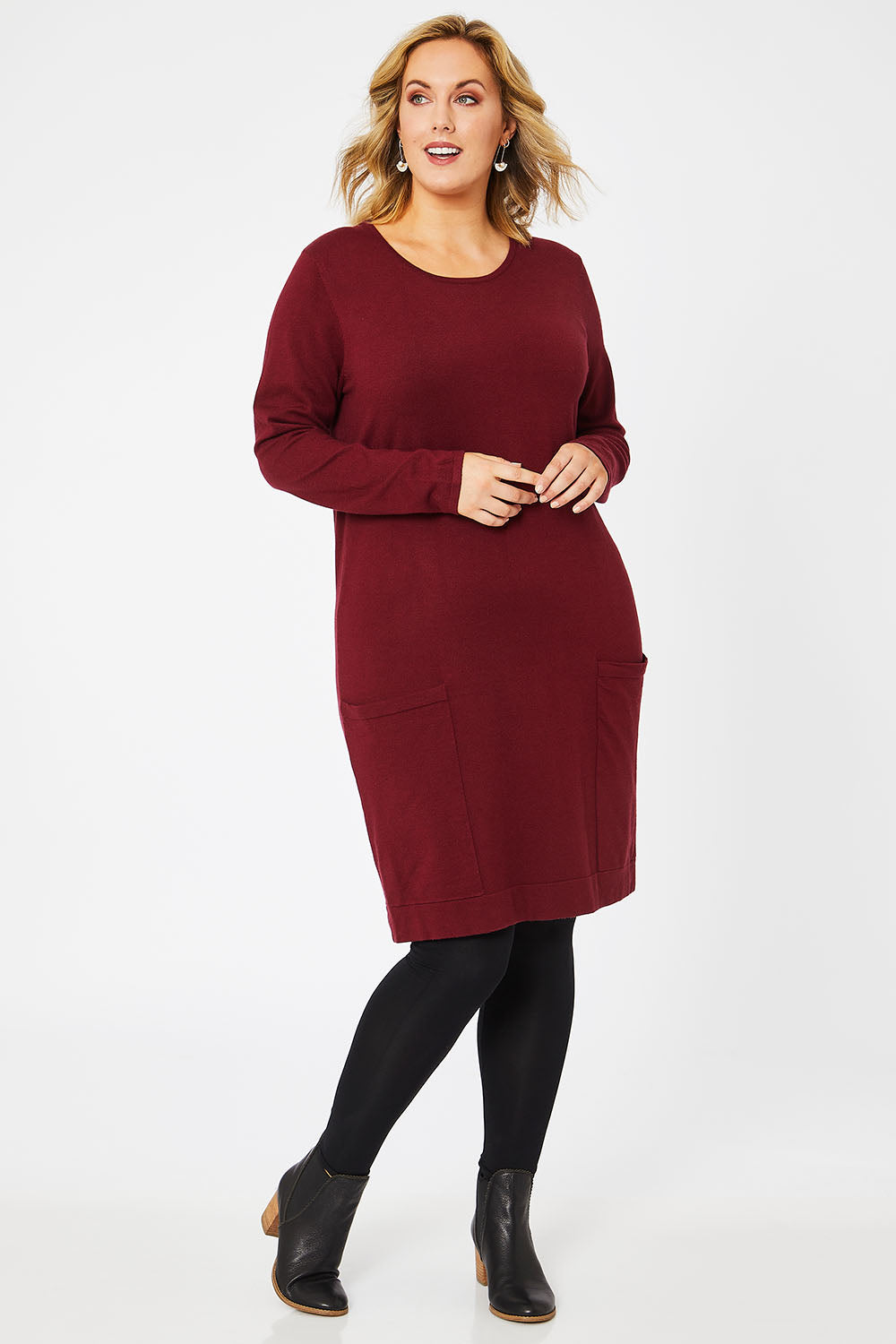 Model Jess wearing size L of The Pocket Detail Dress in colour Burgundy (Red), from the front, showing the whole outfit