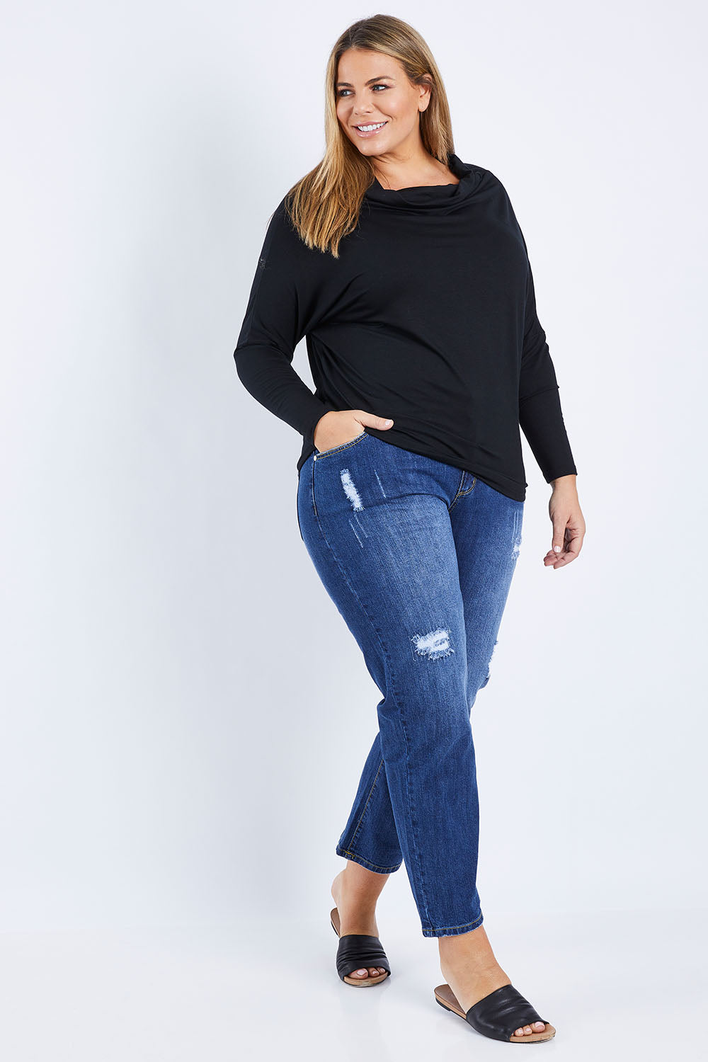 Model Fiona wearing size 16 of The Distressed Boyfriend Jean in colour Mediumblue (Blue), from the front, showing the whole outfit