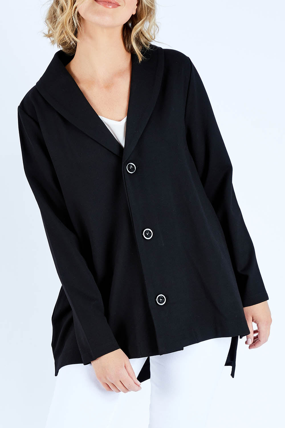 Model Chelsea wearing size S of The Button Up Ponte Jacket in colour Black (Black), from the front, cropped image