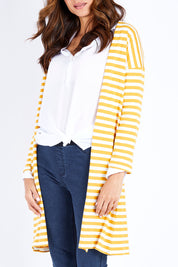 Model Ilona wearing size 10 of The Relaxed Cotton Cardi in colour Muststripe, from the front, cropped image