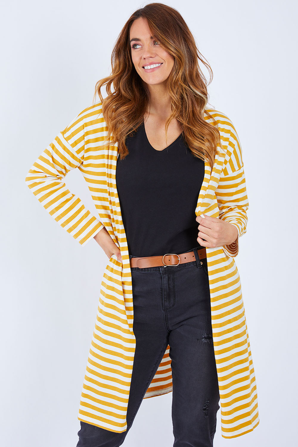 Model Laura wearing size 14 of The Relaxed Cotton Cardi in colour Muststripe, from the front, cropped image