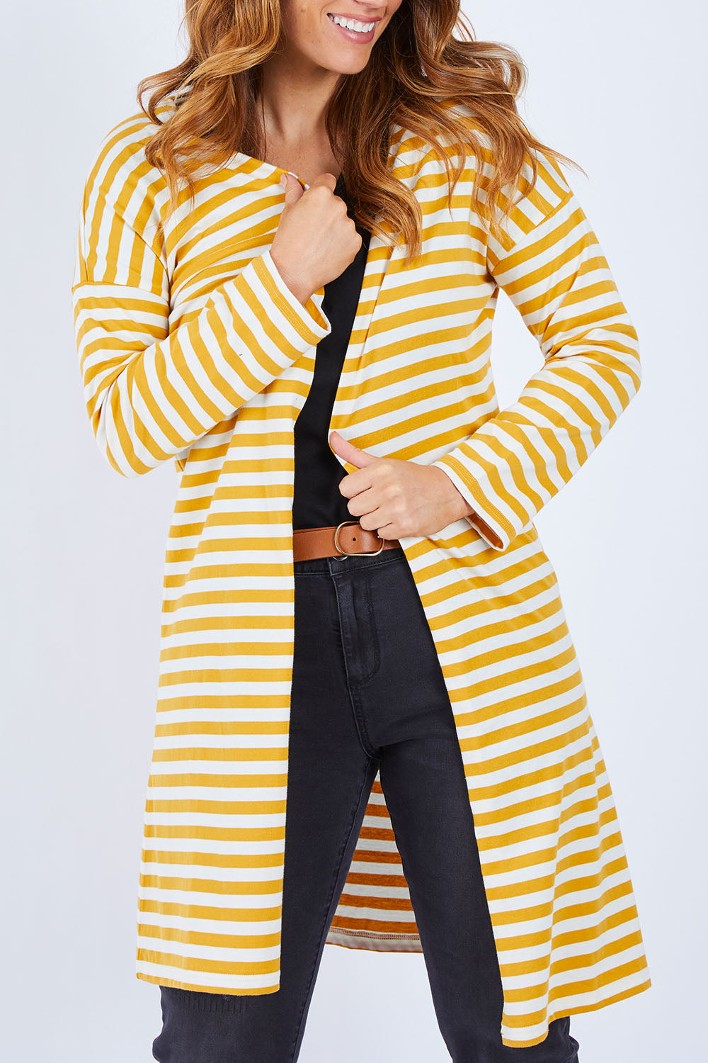 Model Laura wearing size 14 of The Relaxed Cotton Cardi in colour Muststripe, from the front, cropped image