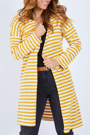 Model Laura wearing size 14 of The Relaxed Cotton Cardi in colour Muststripe, from the front, cropped image