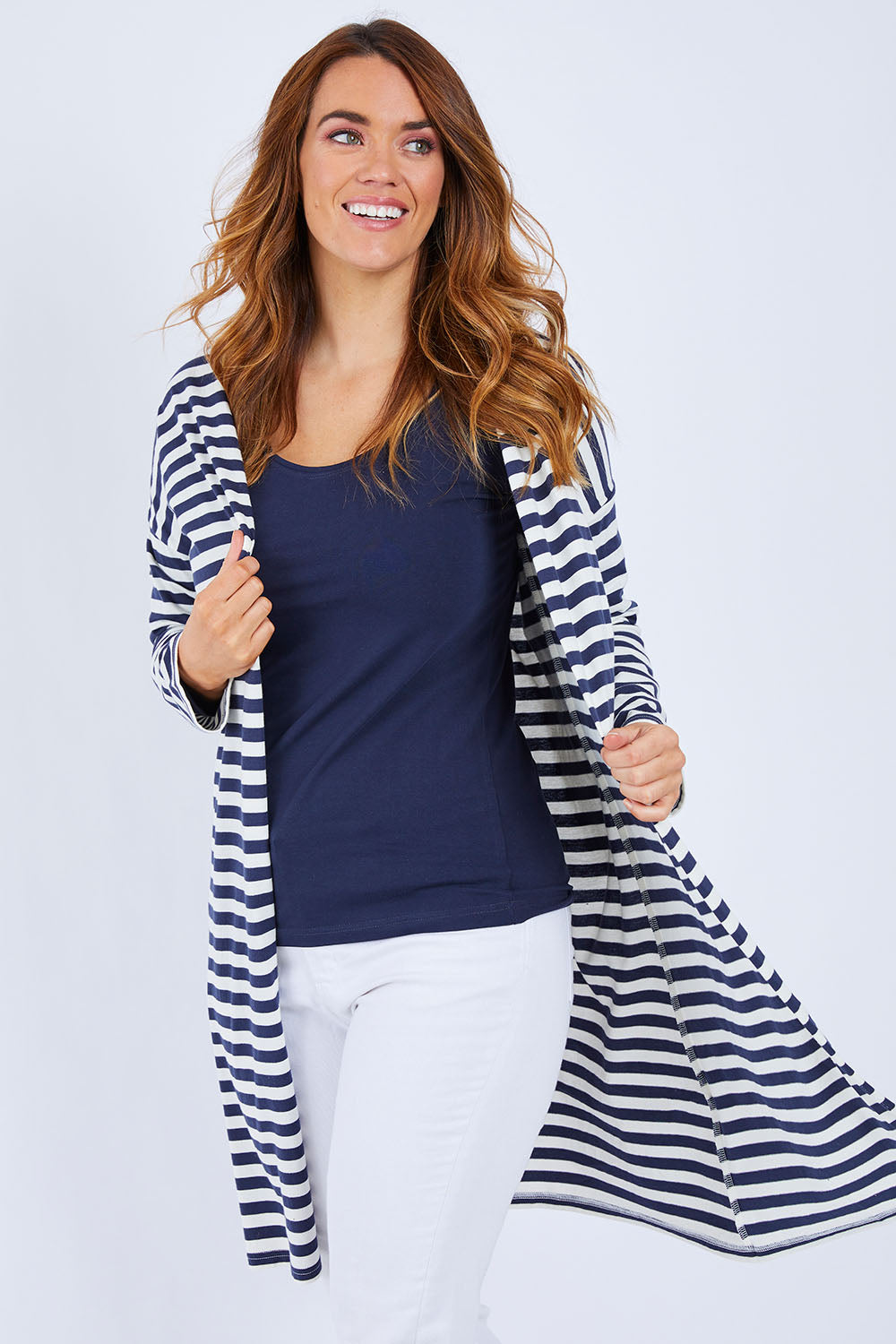 Model Laura wearing size 14 of The Relaxed Cotton Cardi in colour Navystripe (Blue), from the front, cropped image