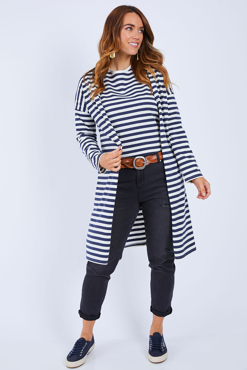 Model Laura wearing size 14 of The Relaxed Cotton Cardi in colour Navystripe (Blue), from the front, showing the whole outfit