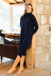 Model Amanda wearing size S of The Roll Neck Tunic Dress in colour Navy (Blue), from the front, showing the whole outfit