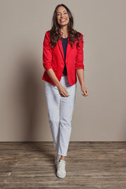 Model Amanda wearing size 10 of The Everyday Blazer in colour Firered (Red), from the front, showing the whole outfit