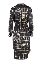 Product shot of The Luxe Viscose Drawstring Dress in colour Sketch (Black), from the back