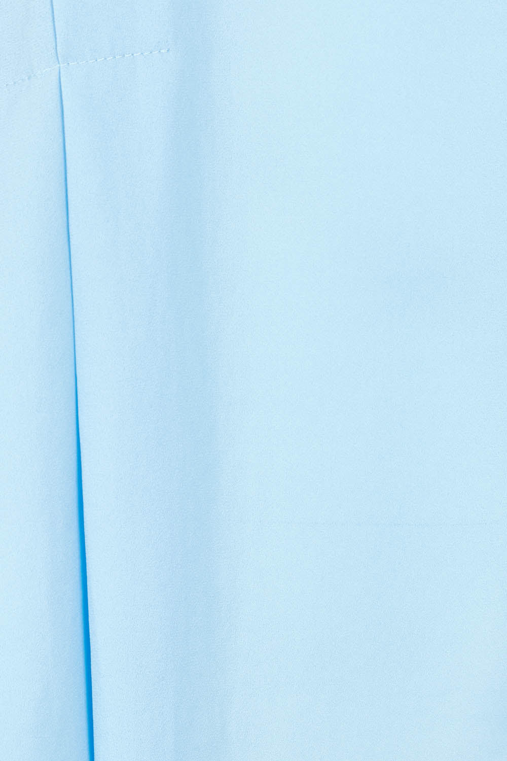 Product shot of The Asymmetrical Tank Top in colour Sky (Blue), detail