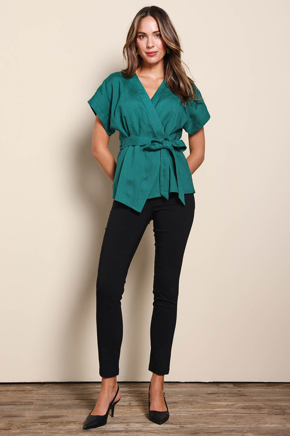 Model Madelinec wearing size 10 of the The Linen Tencel Kimono Top - Emerald in colour Emerald, from the front