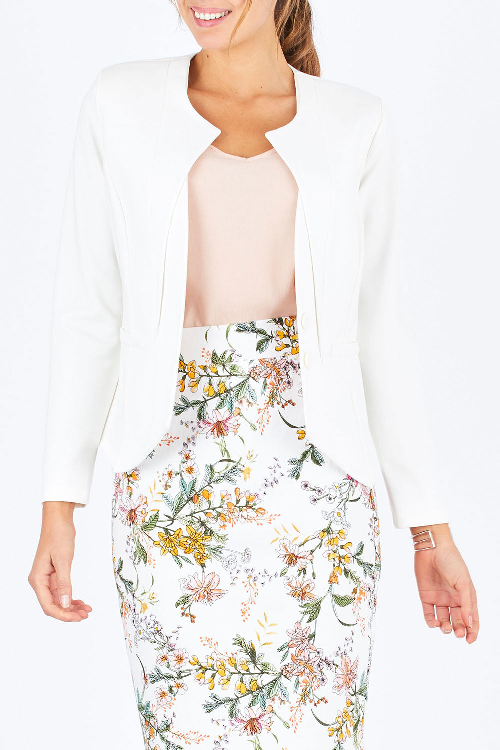 Model Madeline wearing size 10 of The Define Ponte Jacket in colour Ivory (White), from the front, cropped image