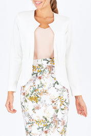Model Madeline wearing size 10 of The Define Ponte Jacket in colour Ivory (White), from the front, cropped image