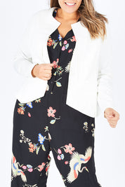 Model Natalia wearing size 14 of The Define Ponte Jacket in colour Ivory (White), from the front, cropped image
