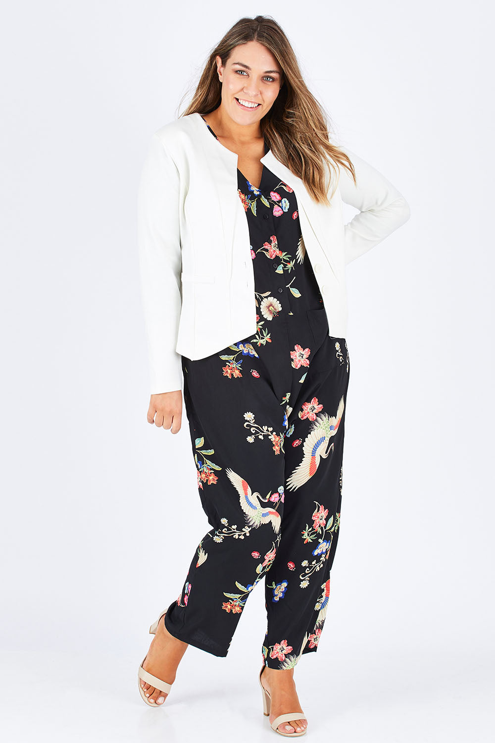 Model Natalia wearing size 14 of The Define Ponte Jacket in colour Ivory (White), from the front, showing the whole outfit