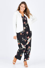 Model Natalia wearing size 14 of The Define Ponte Jacket in colour Ivory (White), from the front, showing the whole outfit