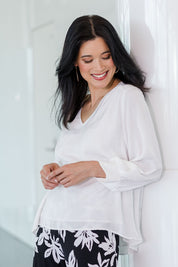 Model Miranda wearing size 10 of The Luxe Dobby Blouse in colour White (White), from the front, showing the whole outfit