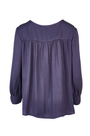 Product shot of The Luxe V Neck Blouse in colour Slate (Grey), from the back