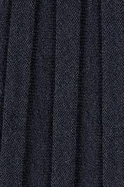 Product shot of The Pleated Knit Dress in colour Black (Black), detail