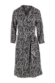 Product shot of The Define Printed Wrap Dress in colour Fern (Black), from the front
