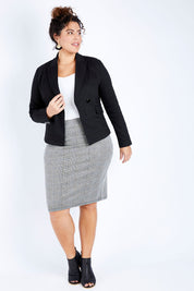 Model Jess wearing size 16 of The Desire Jacket in colour Black (Black), from the front, showing the whole outfit