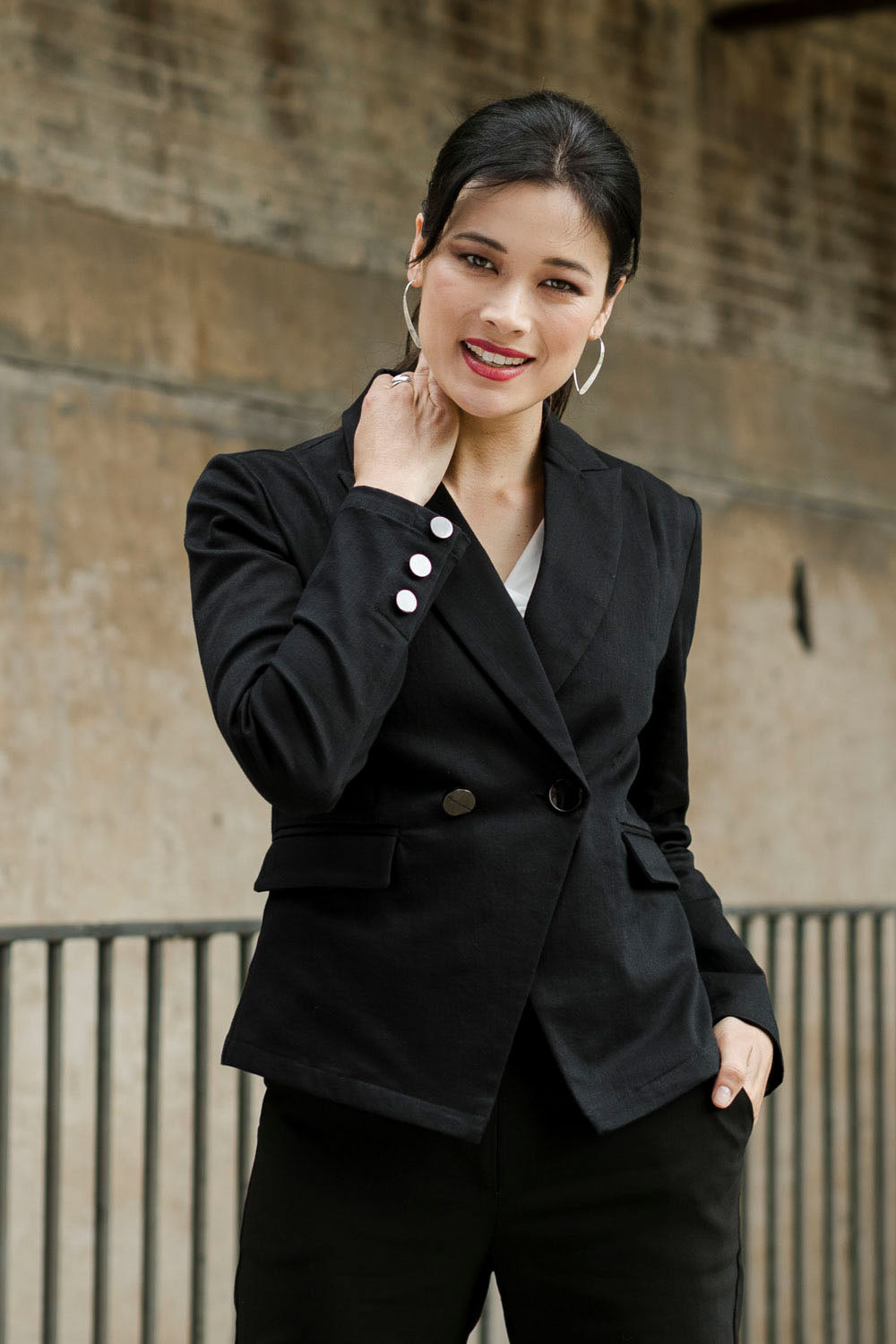 Model Miranda wearing size 10 of The Desire Jacket in colour Black (Black), from the front, showing the whole outfit