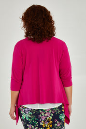 Model Maddy wearing size 16 of The Drape Cardi in colour Hotpink (Pink), from the back