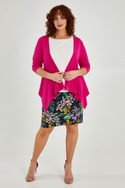 Model Maddy wearing size 16 of The Drape Cardi in colour Hotpink (Pink), from the front, showing the whole outfit
