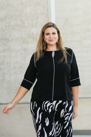 Model Fiona wearing size 16 of The Contrast Detail Top in colour Black (Black), from the front, showing the whole outfit