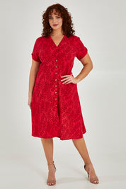 Model Maddy wearing size 16 of The Printed Cotton V Neck Dress in colour Bamboo (Red), from the front, showing the whole outfit