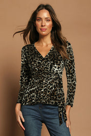 Model Madeline wearing size 10 of The Printed Velvet Side Ring Detail Top in colour Leopard (Black), from the front, showing the whole outfit
