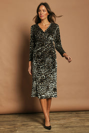 Model Madeline wearing size 10 of The Printed Velvet Side Ring Detail Top in colour Leopard (Black), from the front, showing the whole outfit