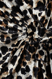 Product shot of The Printed Velvet Side Ring Detail Top in colour Leopard (Black), detail