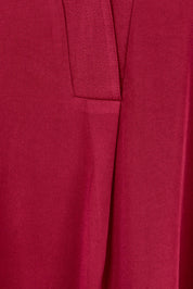 Product shot of The Button Detail Cuff Blouse in colour Garnet (Red), detail